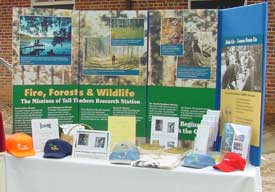 Education booth at Pinewoods Bird Festival informs the public of prescribed fire benefits.